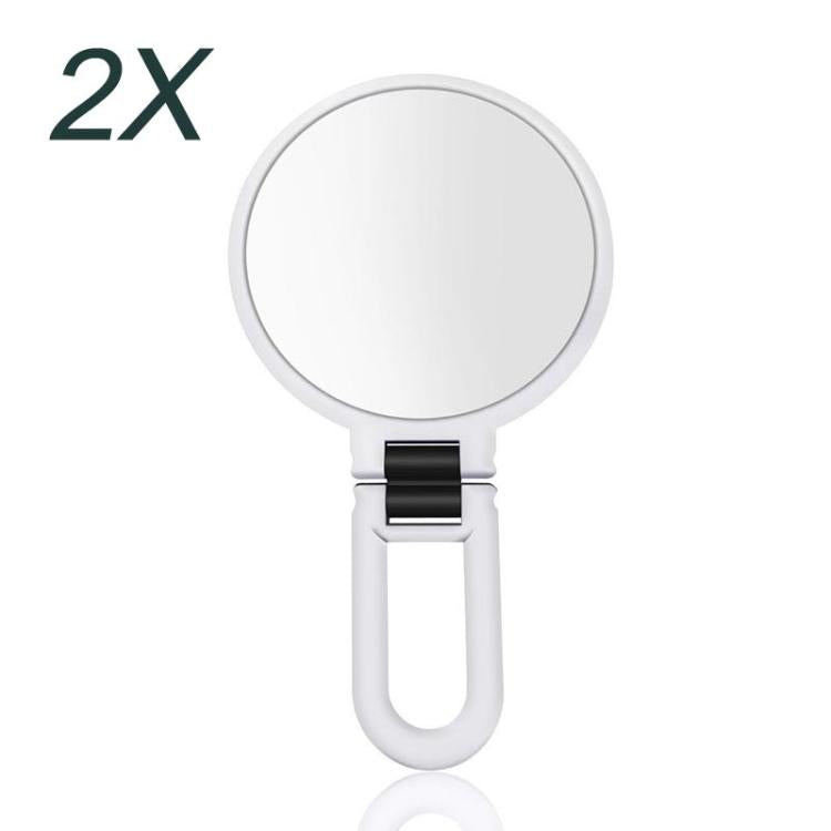 2X magnifying makeup mirror with round glass and white folding handle