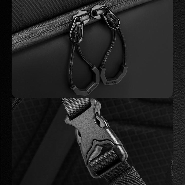 Black backpack side strap with metal buckles and adjustable webbing for secure attachment.