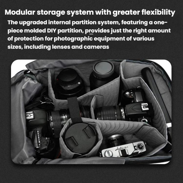 Black camera backpack with modular padded inserts holding lenses and cameras.