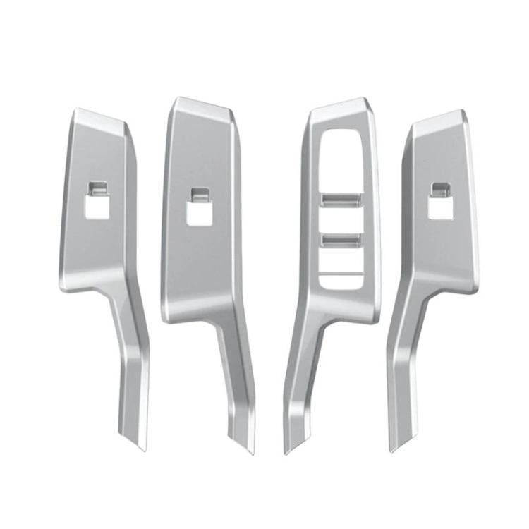 Four-piece silver window switch panel trim stickers with ribbed cutouts