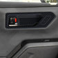 Carbon-fiber inner door handle cover with red safety switch accent