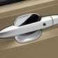 Silver door cup anti-scratch panel sticker on a car door handle area