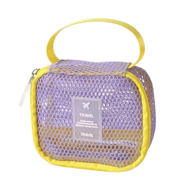 Purple mesh cosmetic bag with top handle, yellow zipper trim, and travel label pocket