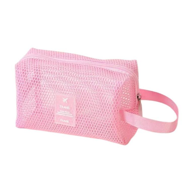 Pink mesh cosmetic organizer pouch with zipper and wrist strap, travel label patch