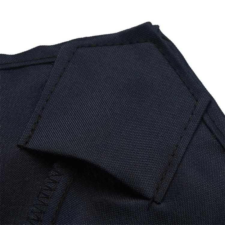 Navy patio umbrella canopy fabric close-up with reinforced stitching