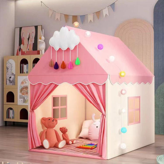 Pink kids indoor play tent with peaked roof, scalloped curtains, window openings, cloud decor