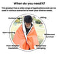 Orange emergency blanket tarp with dark edge, wrapped around a person