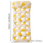 Inflatable floating bed lounger in white with yellow lemon print and white circle holes