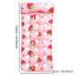Inflatable floating bed lounger in pink with strawberry print and white circle holes