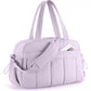 Lavender travel bag with compartments, padded strap, and zippered front pocket