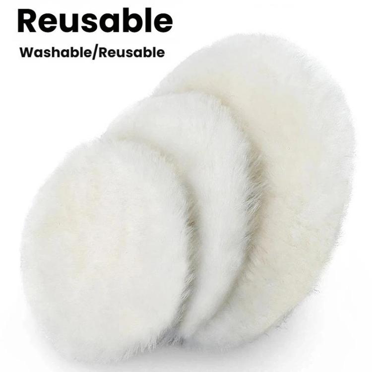 Stacked round white wool polishing pads, long-pile buffing wheels