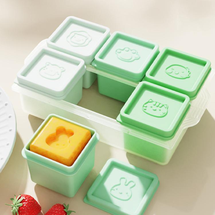 Green and mint silicone baby food storage ice cube tray with matching individual lids