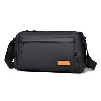 Black crossbody messenger bag with front zip pocket and adjustable shoulder strap