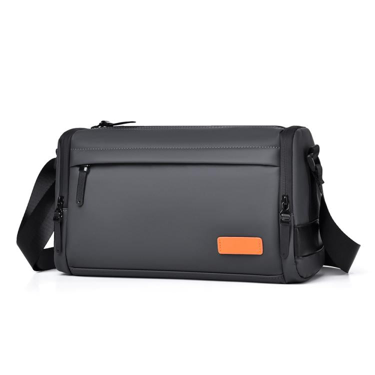 Gray crossbody messenger bag with front zip pocket and adjustable shoulder strap