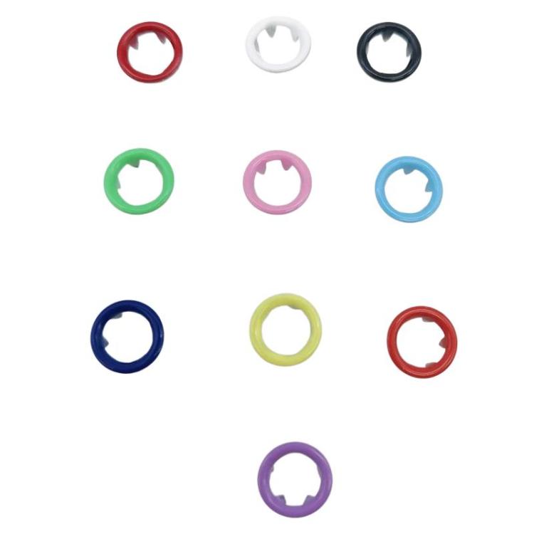 Plastic snap fastener rings in assorted colors with center holes