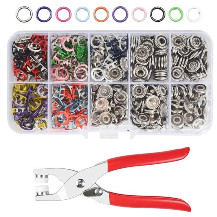 Snap fastener set case with colorful metal buttons and red-handled snap pliers