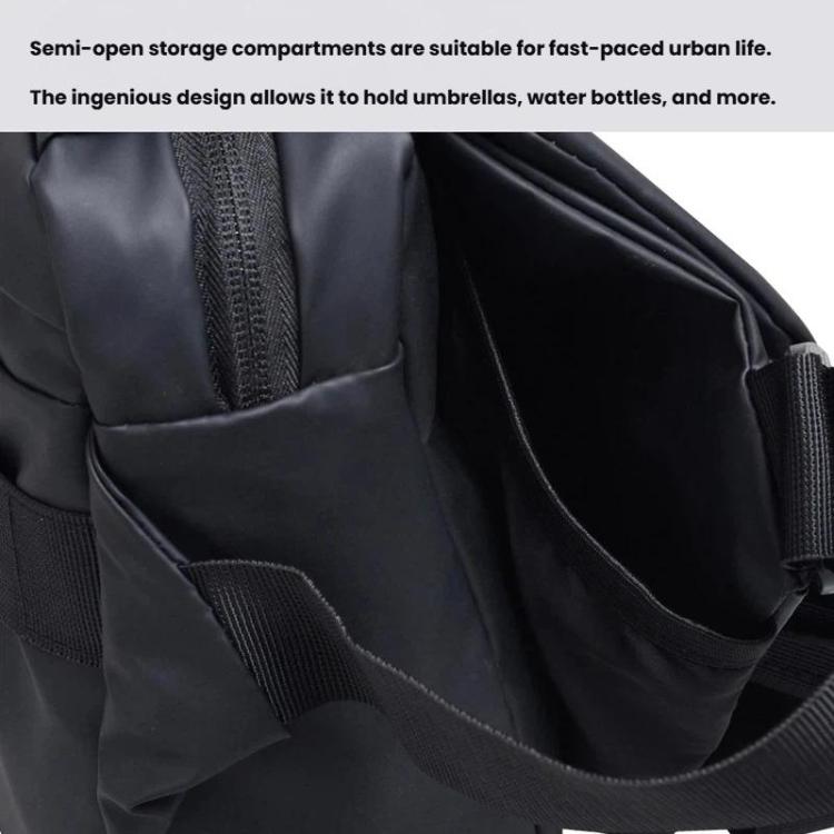 Messenger bag interior with side slip pocket and mesh-lined storage panel