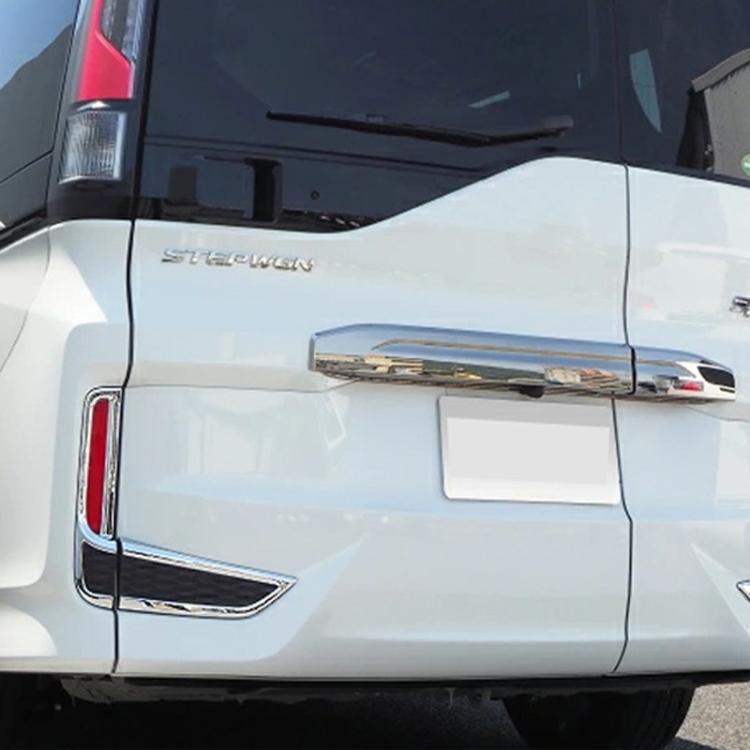 Installed bumper fog lamp decorative strip on car bumper, chrome accents over black grille