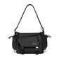 Black crossbody messenger bag with flap front, dual side pouches, and adjustable strap