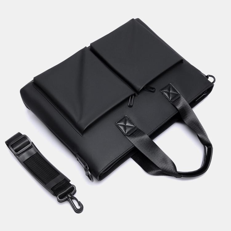Men's waterproof laptop messenger bag in black with top flap, handle, and crossbody strap