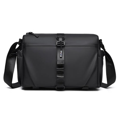 Men's black sling bag with magnetic front buckle and adjustable shoulder strap