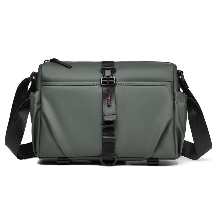 Men's green sling bag with magnetic front buckle and adjustable shoulder strap