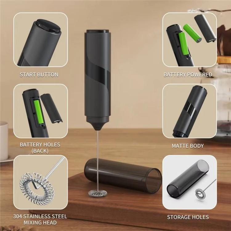Black handheld milk frother with visible battery holes and stainless mixing head