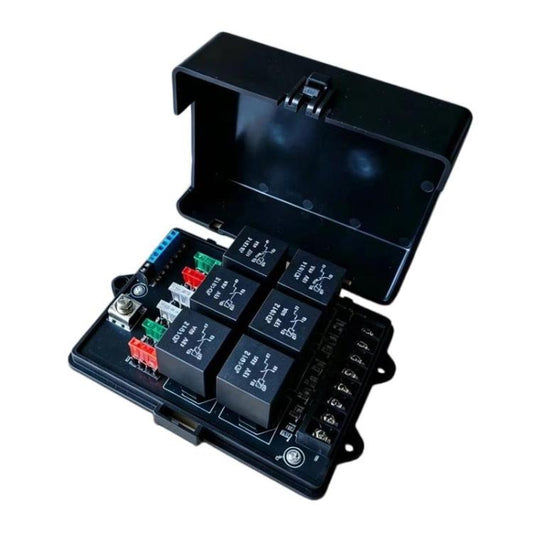 6-way relay fuse box with open black cover and visible terminals