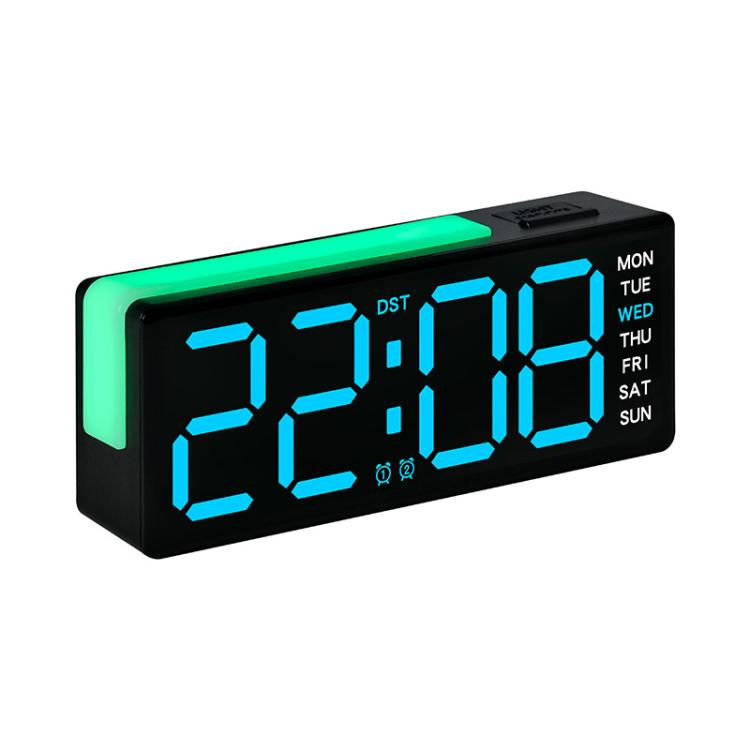 Digital alarm clock with RGB L-shaped night light, green glow numbers and weekday display.