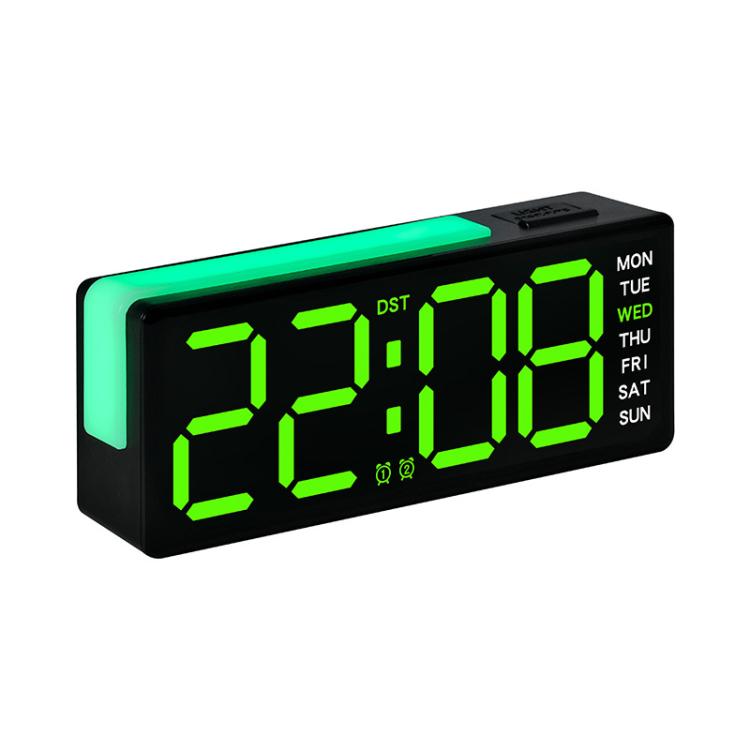 Digital alarm clock with RGB night light, green time digits and weekday panel on screen.