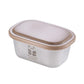 Mini stainless steel airtight condiment container with beige lid, closed