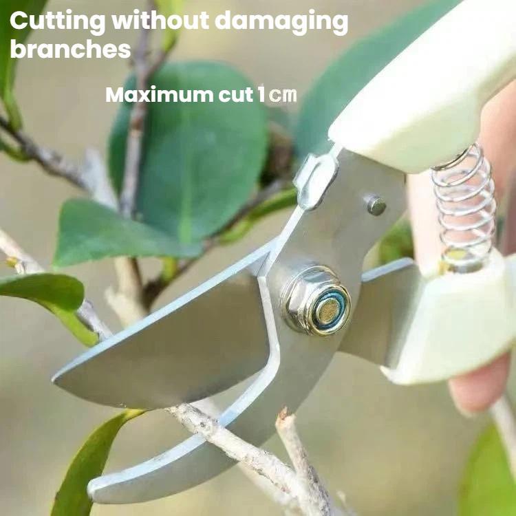 Ivory-handled pruning shears cutting branches, stainless steel blades