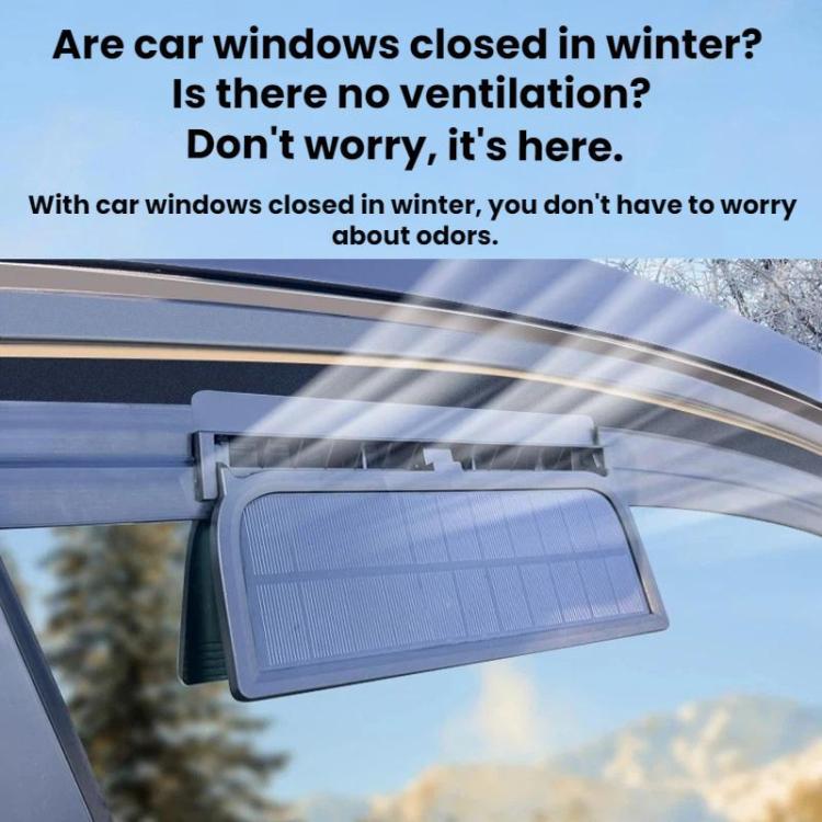 White solar ventilation fan installed above the car windshield