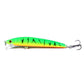 Fishing lure, bright green top with orange sides and black marks, two treble hooks