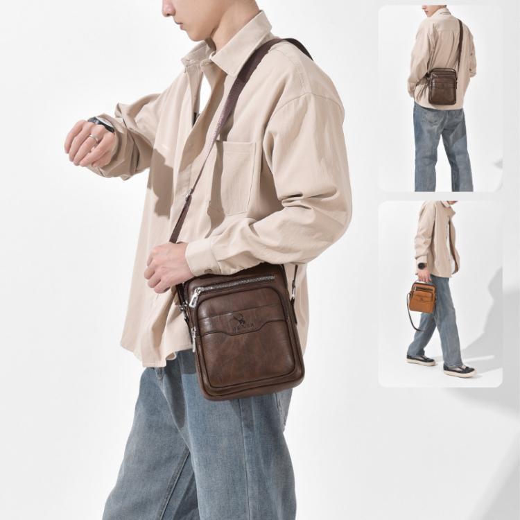 Men's crossbody bag in dark brown PU leather worn on body, adjustable shoulder strap