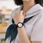 MINGRUI kids analog watch on wrist, black dial and strap, quartz movement