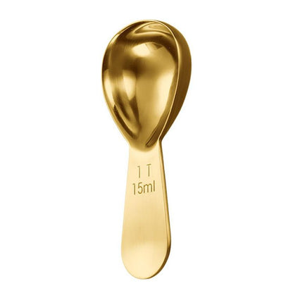 Gold coffee measuring spoon with 15ml scale markings, oval bowl and long handle