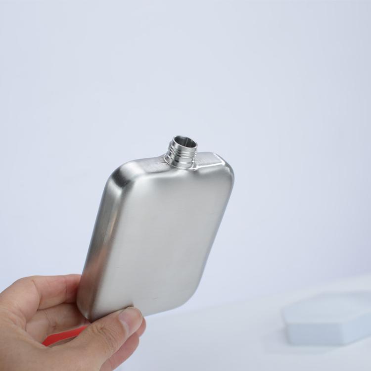 Stainless steel hip flask with threaded screw cap, pocket liquor bottle