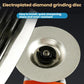 Grinding disc mounted on an angle grinder head, silver-gray abrasive face with center hub