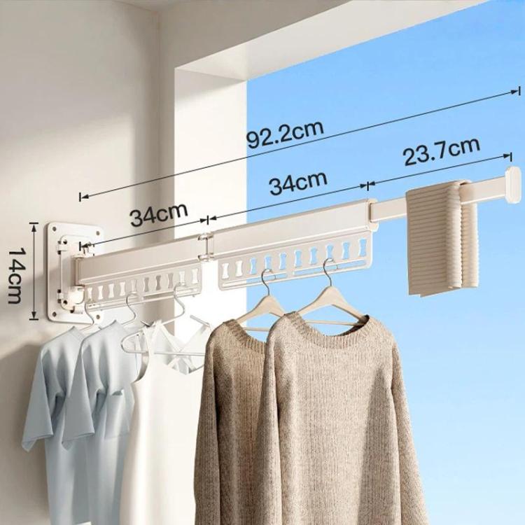 Extended wall-mounted clothes drying rack with white rods and hanging clips