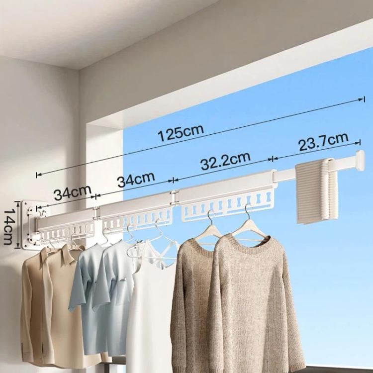 Long wall-mounted clothes drying rack with white frame, pegs, and clips