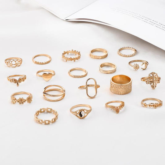 19-piece rose-gold tone ring set with heart, flower, and chain designs, assorted styles