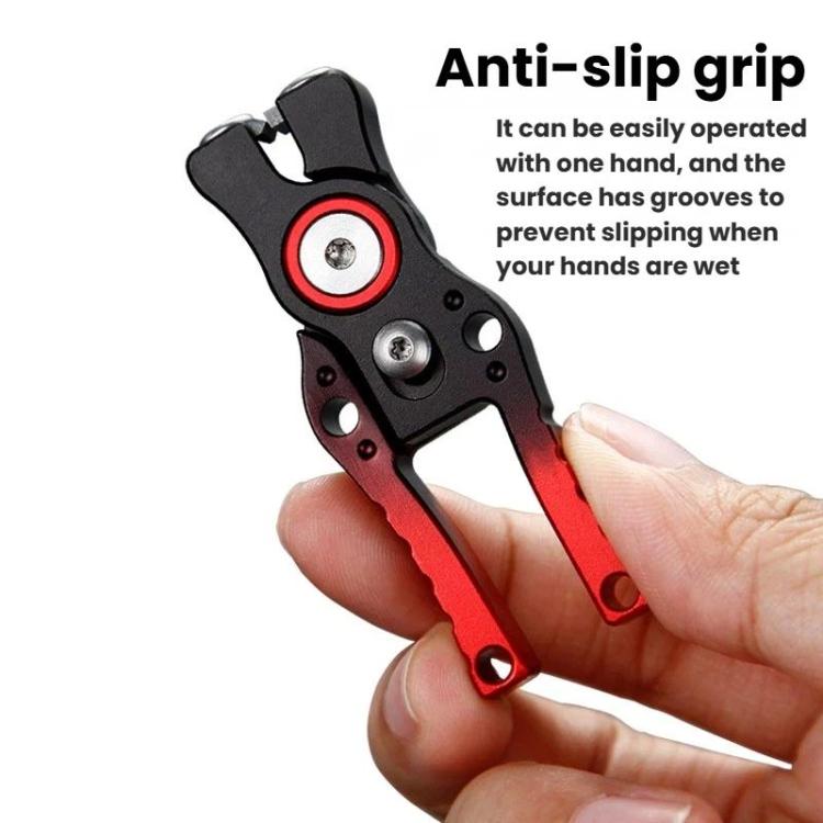 Fishing line cutter with red-and-black anti-slip grip, held by fingers