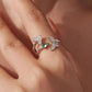 Silver butterfly double-layer adjustable ring with green center stone and clear accents