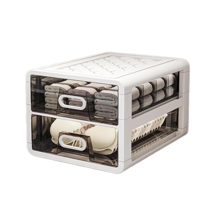 Drawer-style sock organizer with clear compartments and neatly folded socks inside