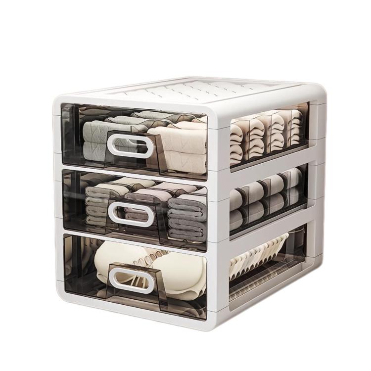 Multi-drawer sock organizer box with clear fronts and stacked folded socks