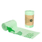 Compostable PLA garbage bag roll with open flat bag, light green printed leaves