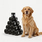 Stacked black dog waste bag rolls with light paw-print icons