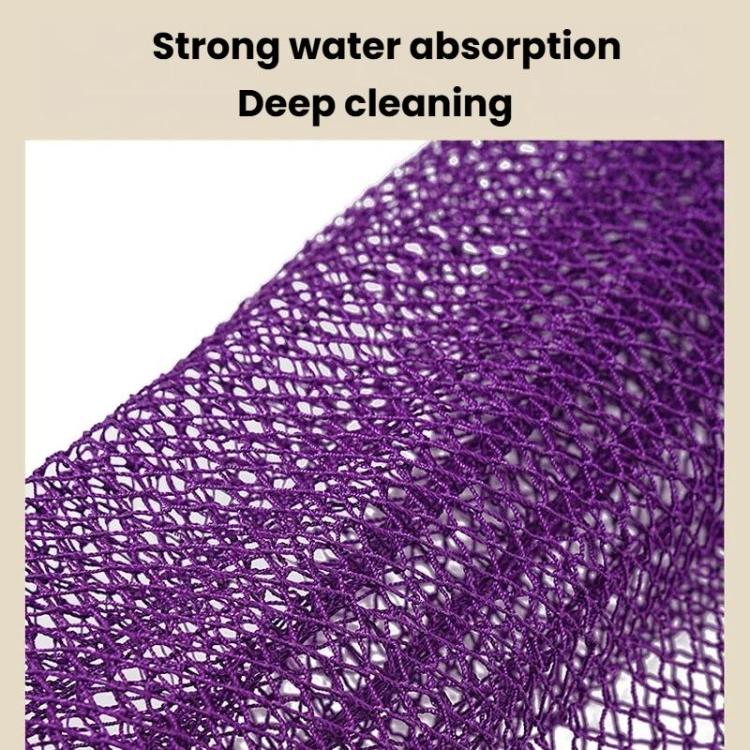 Close-up of purple exfoliating mesh bath towel surface