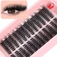 Black curled single-cluster eyelash strips with longer outer clusters on tray